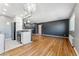Open concept kitchen featuring stainless steel appliances and modern lighting at 525 Jackson St # 304, Denver, CO 80206
