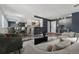 Bright living room with sleek furniture, dining area, and modern decor at 525 Jackson St # 304, Denver, CO 80206