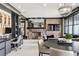Stylish room with a fireplace, built-in desk and shelving, and comfortable seating for relaxing and entertaining at 4475 S Downing St, Cherry Hills Village, CO 80113