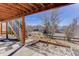 Backyard of the home with views of neighborhood and a small playground area at 22388 Quail Run Dr, Parker, CO 80138