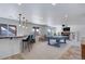 Spacious basement featuring a bar area, pool table, and cozy fireplace, perfect for entertaining guests at 22388 Quail Run Dr, Parker, CO 80138