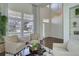 Light-filled living room with high ceilings and large windows offering great views and natural light at 22388 Quail Run Dr, Parker, CO 80138