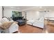 Open finished basement with large seating area and entertainment center at 3431 Fantasy Pl, Castle Rock, CO 80109