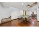 Finished basement with ping pong table, staircase, and a small dining area at 3431 Fantasy Pl, Castle Rock, CO 80109