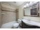 Updated bathroom featuring a tiled shower/tub and modern vanity at 3431 Fantasy Pl, Castle Rock, CO 80109