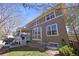 Multi-story home featuring a covered porch, large windows, and a landscaped yard at 3431 Fantasy Pl, Castle Rock, CO 80109