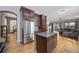 Open kitchen concept featuring granite countertops, stainless steel appliances, and wood cabinets at 3431 Fantasy Pl, Castle Rock, CO 80109