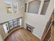 A soaring living room boasting large windows and a fireplace at 3431 Fantasy Pl, Castle Rock, CO 80109