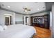 Spacious main bedroom with hardwood floors and built in entertainment center at 3431 Fantasy Pl, Castle Rock, CO 80109