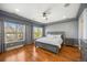 Bedroom featuring a large bed and two windows at 3431 Fantasy Pl, Castle Rock, CO 80109