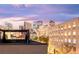 Stunning city view from a rooftop deck in a vibrant urban setting at 1333 Elati St # 1, Denver, CO 80204