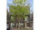 Contemporary townhome exterior with multi-level balconies, large windows, and modern architecture at 1333 Elati St # 1, Denver, CO 80204