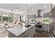 Open-concept kitchen with stainless steel appliances and a view of the living area at 1333 Elati St # 1, Denver, CO 80204
