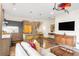Open-concept living room and kitchen with modern furnishings and plenty of natural light at 1333 Elati St # 1, Denver, CO 80204