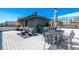 Entertaining rooftop deck featuring dining and lounge furniture, plus a grill at 1333 Elati St # 1, Denver, CO 80204