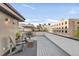 Rooftop deck with lounge furniture offering downtown skyline views at 1333 Elati St # 1, Denver, CO 80204