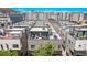 An urban home boasts a rooftop patio with ample seating, a grill, and a relaxing hammock, perfect for outdoor entertaining at 1333 Elati St # 1, Denver, CO 80204