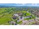 Spectacular aerial view of the community clubhouse, pool, and surrounding neighborhood at 21392 E Stroll Ave, Parker, CO 80138