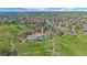 Aerial view features a community pool, clubhouse, parks, and walking trails in a Gathering-friendly neighborhood at 21392 E Stroll Ave, Parker, CO 80138