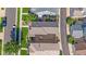 An aerial view of the property showcases its well-maintained backyard and proximity to neighboring homes at 21392 E Stroll Ave, Parker, CO 80138