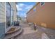 Paver patio features a basketball hoop, grill, and table for outdoor dining, creating an inviting outdoor space at 21392 E Stroll Ave, Parker, CO 80138