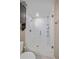 Shower with glass doors, tiled walls, and modern shower fixtures at 21392 E Stroll Ave, Parker, CO 80138