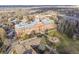 Stunning aerial view of a community center featuring a grand building with beautiful architecture and landscaping at 4454 Utica St, Denver, CO 80212