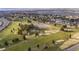 Expansive aerial shot of the community golf course showcasing lush greenery and open space at 4454 Utica St, Denver, CO 80212