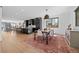 Open-concept living space with modern kitchen, dining area, and bright living room at 4454 Utica St, Denver, CO 80212