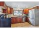 Efficient kitchen with stainless steel appliances, ample cabinet space, and modern countertops at 176 W Elm St, Elizabeth, CO 80107