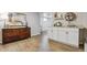 An open living space offers a coffee bar, light wood flooring, and modern decor accents, enhancing its bright appeal at 176 W Elm St, Elizabeth, CO 80107