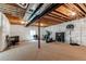 Unfinished basement with exposed ceiling, equipment, and plenty of potential at 13970 Craig Way, Broomfield, CO 80020