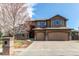Stunning two-story home boasts a 3-car garage and lush landscaping in a desirable neighborhood at 13970 Craig Way, Broomfield, CO 80020
