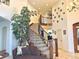 Spacious foyer with a curved staircase, soaring ceilings, stylish decor, and an open, airy feel at 13970 Craig Way, Broomfield, CO 80020