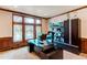 Cozy home office with custom wood trim, lots of natural light, and built in storage at 13970 Craig Way, Broomfield, CO 80020