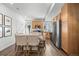Bright kitchen features wood cabinets, stainless steel appliances, granite countertops, and hardwood style floors at 4060 N Rome St, Aurora, CO 80019