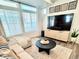 Inviting living area with comfortable seating, a large window, and a modern media center at 4060 N Rome St, Aurora, CO 80019