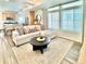 Comfortable living room showcasing an open floor plan with stylish decor, and natural light at 4060 N Rome St, Aurora, CO 80019