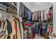 Organized walk-in closet with ample storage and hanging space for clothes and accessories at 4060 N Rome St, Aurora, CO 80019