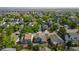 Charming neighborhood showcases well-maintained homes with lush trees and manicured lawns at 9816 Garwood St, Littleton, CO 80125