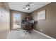 Functional home office features a desk, chair, and window for a productive workspace at 9816 Garwood St, Littleton, CO 80125