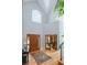 Grand foyer with high ceilings, natural light, and a view into adjacent rooms at 2345 Spotswood Pl, Boulder, CO 80304