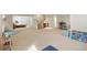 Spacious finished basement with carpet and an open floor plan for recreation and entertaining at 2345 Spotswood Pl, Boulder, CO 80304