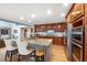 Gourmet kitchen featuring granite countertops, stainless steel appliances, and custom cabinetry at 2345 Spotswood Pl, Boulder, CO 80304