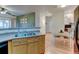 Open kitchen boasts an eat in area and a large window for plenty of natural light at 8369 S Independence Cir # 205, Littleton, CO 80128