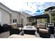 Backyard patio with outdoor furniture, fire pit, and a covered deck provides a comfortable outdoor living space at 740 W Lancers Ct, Monument, CO 80132