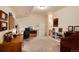 Well-lit home office with dual desks, ample storage, and a cozy, organized workspace at 740 W Lancers Ct, Monument, CO 80132