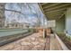 A backyard with a patio featuring stone pavers, green siding, and planter boxes at 1117 Elysian Field Dr # A, Lafayette, CO 80026