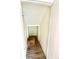 Hallway leading to closet space with wood floor and white walls at 1117 Elysian Field Dr # A, Lafayette, CO 80026