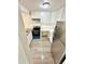 Bright kitchen with white cabinets, stainless steel appliances, and granite countertops at 1117 Elysian Field Dr # A, Lafayette, CO 80026